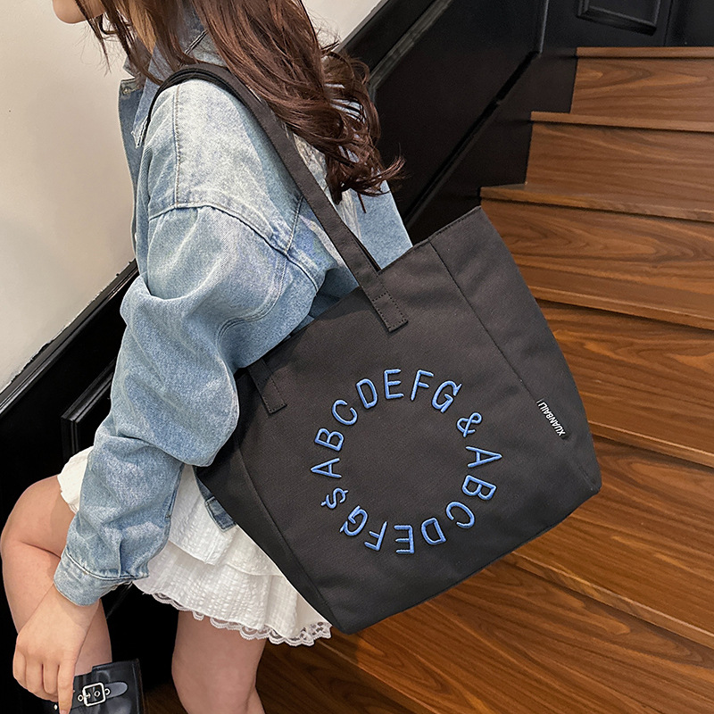 Embroidered letter canvas bag women's large capacity one-shoulder tote bag niche versatile commuter tote bag